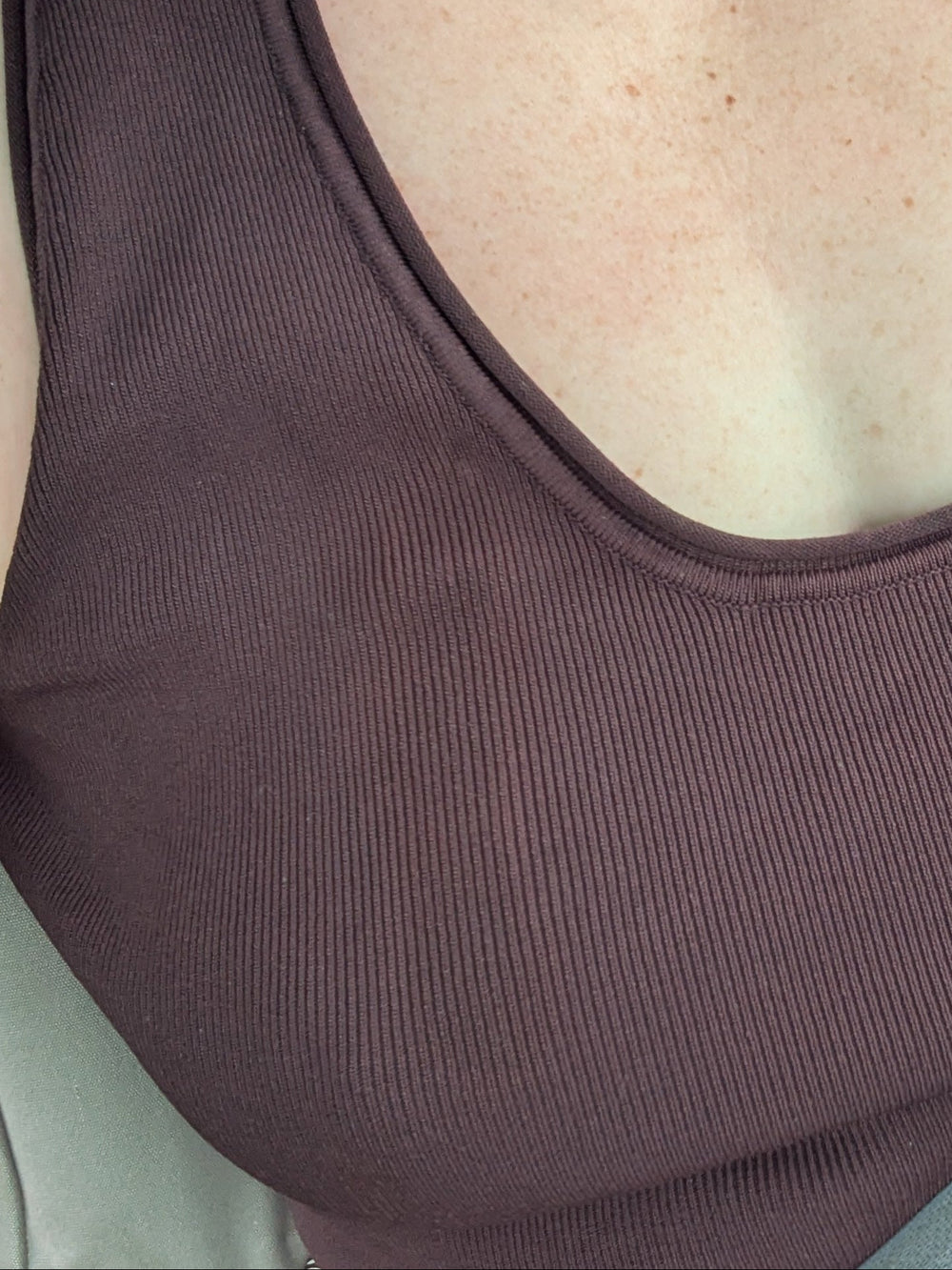 Plum brown shirt, woman wearing, no stain. 